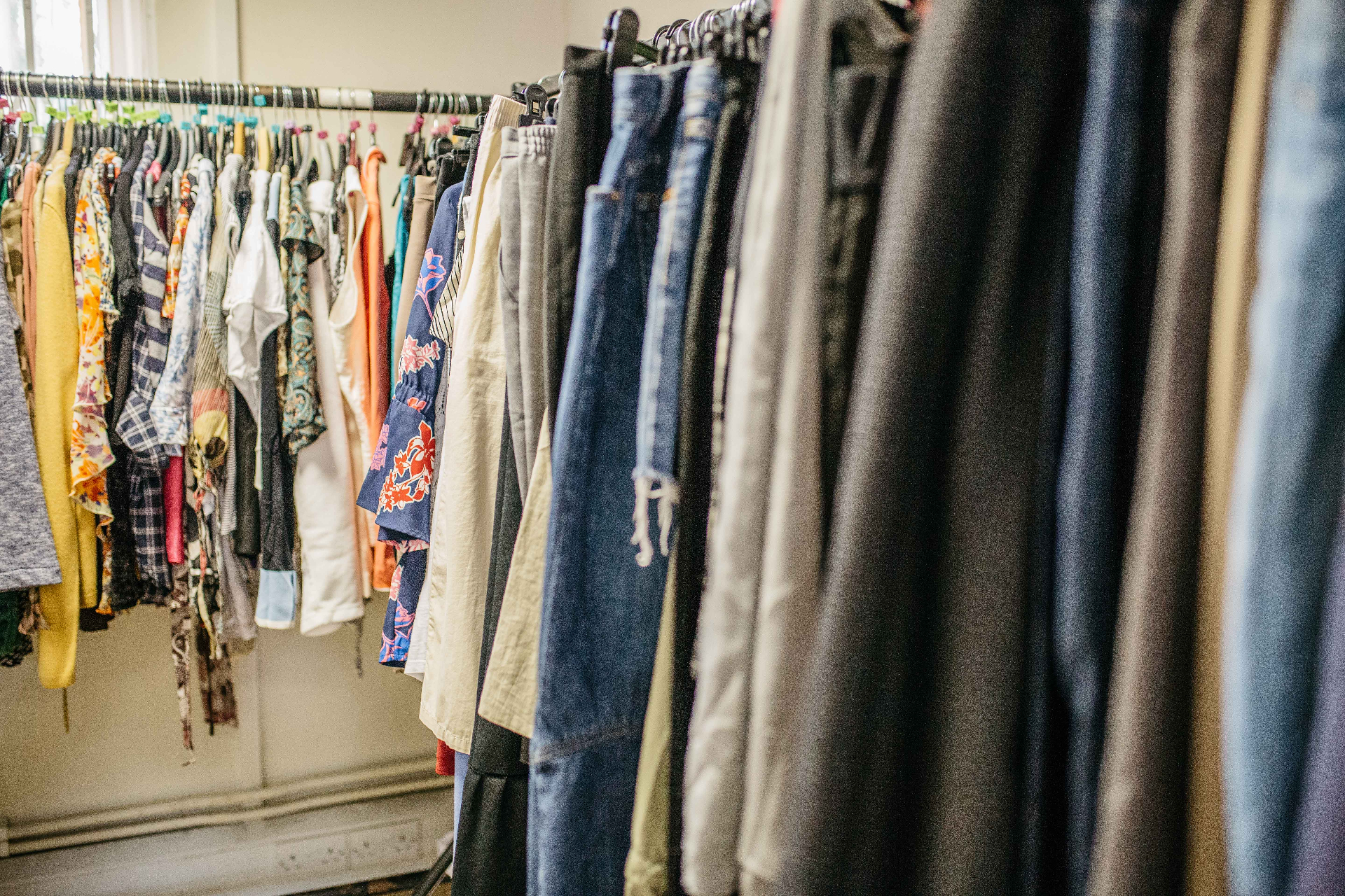 Rails of donated clothing in the Boldmere charity shop