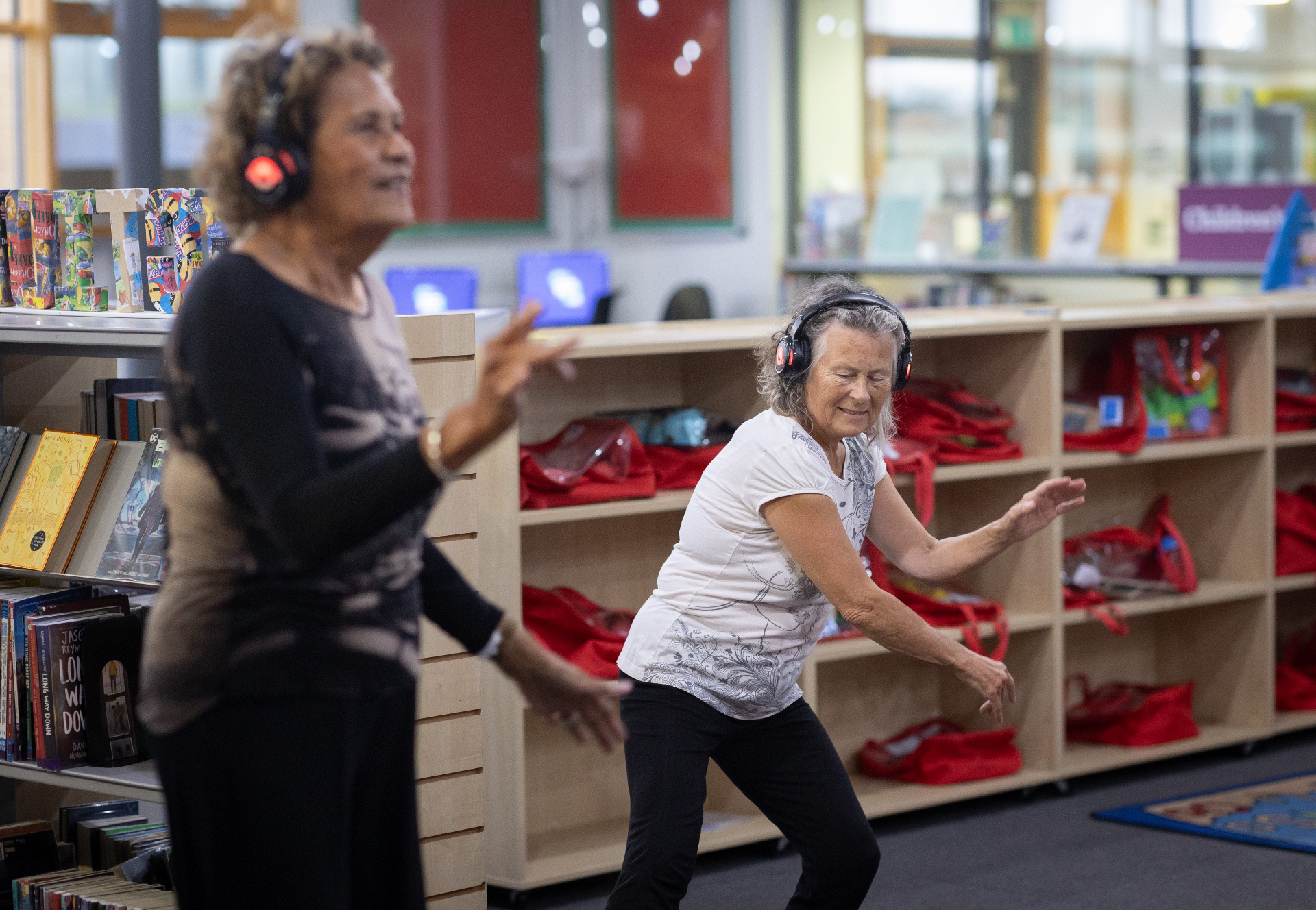 Older women enjoying a community dance session