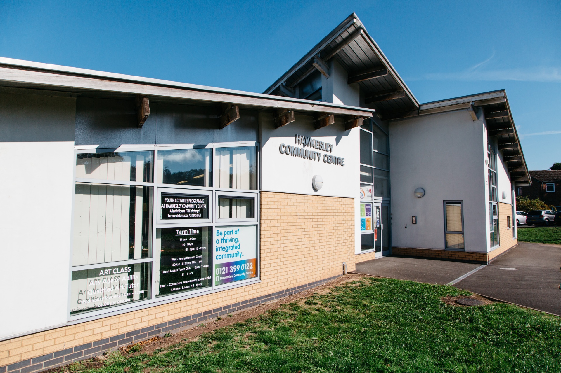 Hawkesley Community Centre exterior on a sunny day with blue sky